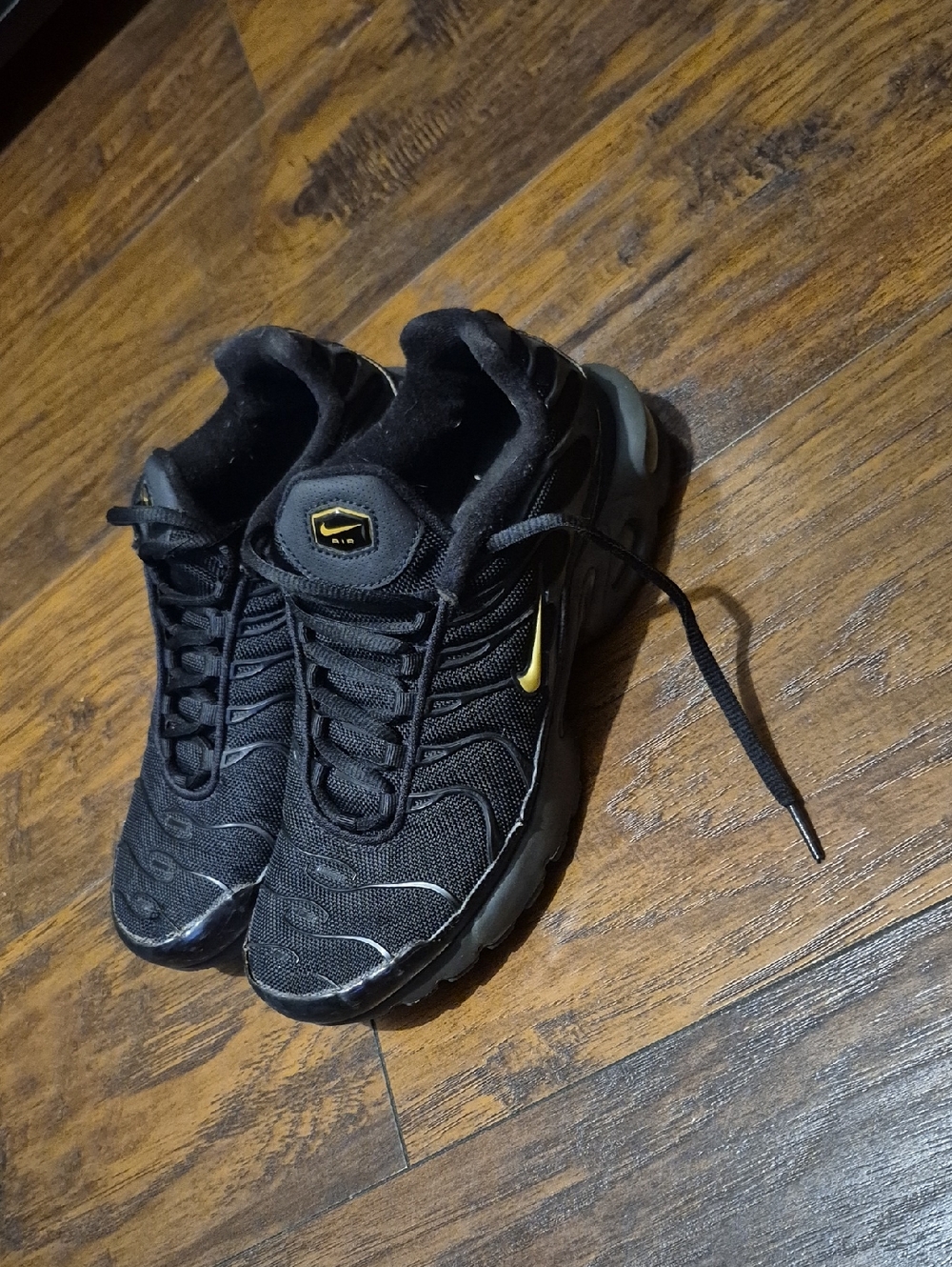 Nike Big Kid Black Sneakers with Yellow Swoosh